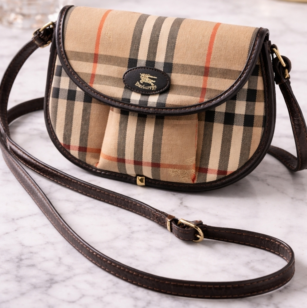 Authentic Burberry vintage crossbody bag featuring the iconic Nova Check plaid p